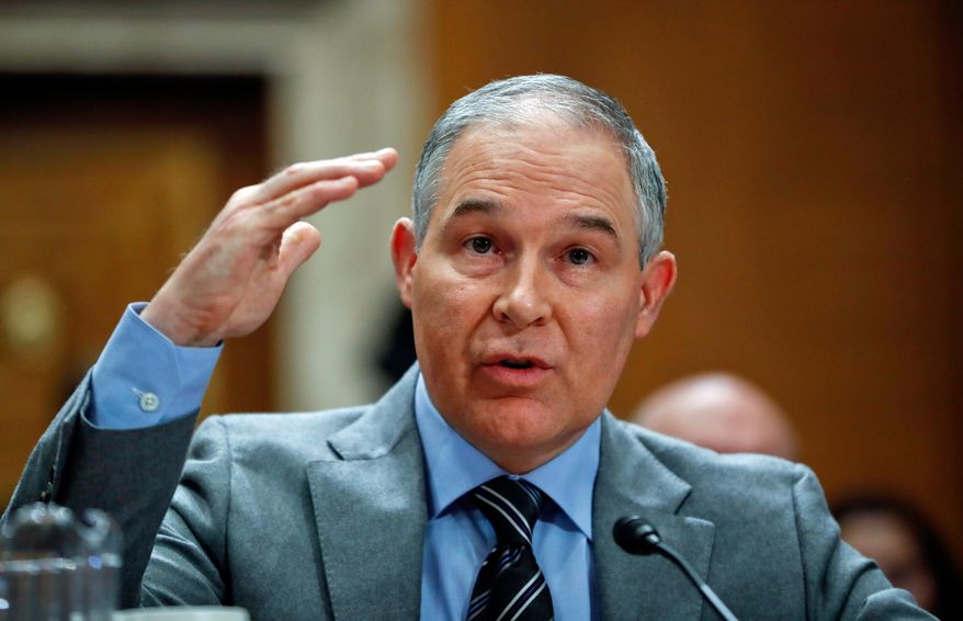 In this Jan. 30, 2018, file photo, Environmental Protection Agency Administrator Scott Pruitt testifies before the Senate Environment Committee on Capitol Hill in Washington. The Republican-led House oversight committee is demanding interviews with five close aides to embattled Pruitt, including his security chief. (AP Photo/Pablo Martinez Monsivais, File)