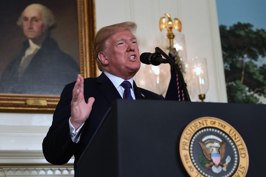 President Donald Trump speaks in the Diplomatic Reception Room of the White House on Friday, April 13, 2018, in Washington, about the United States&#x27; military response to Syria&#x27;s chemical weapon attack on April 7. (AP Photo/Susan Walsh)