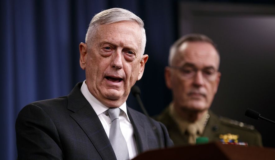 Defense Secretary Jim Mattis, joined by Joint Chiefs Chairman Gen. Joseph Dunford, speaks at the Pentagon, Friday, April 13, 2018, on the U.S. military response, along with France and Britain, in response to Syria&#x27;s chemical weapon attack on April 7.​ (AP Photo/Carolyn Kaster)