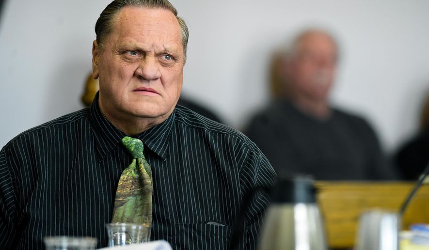 FILE - In this March 9, 2018, file photo, Paul Jenkins listens to testimony in Helena, Mont., during a hearing to review new DNA evidence related to the murder of Donna Meagher, which Jenkins was convicted of in 1995. A Montana judge has vacated the deliberate homicide conviction of Jenkins and another man in the 1995 death of the Helena woman and ordered new trials.(Thom Bridge /Independent Record via AP, File)