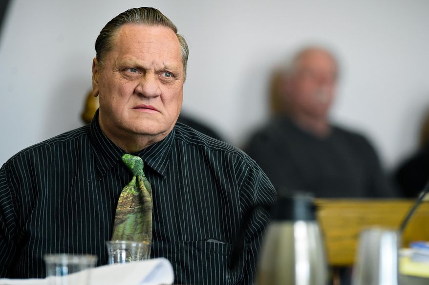 FILE - In this March 9, 2018, file photo, Paul Jenkins listens to testimony in Helena, Mont., during a hearing to review new DNA evidence related to the murder of Donna Meagher, which Jenkins was convicted of in 1995. A Montana judge has vacated the deliberate homicide conviction of Jenkins and another man in the 1995 death of the Helena woman and ordered new trials.(Thom Bridge /Independent Record via AP, File)