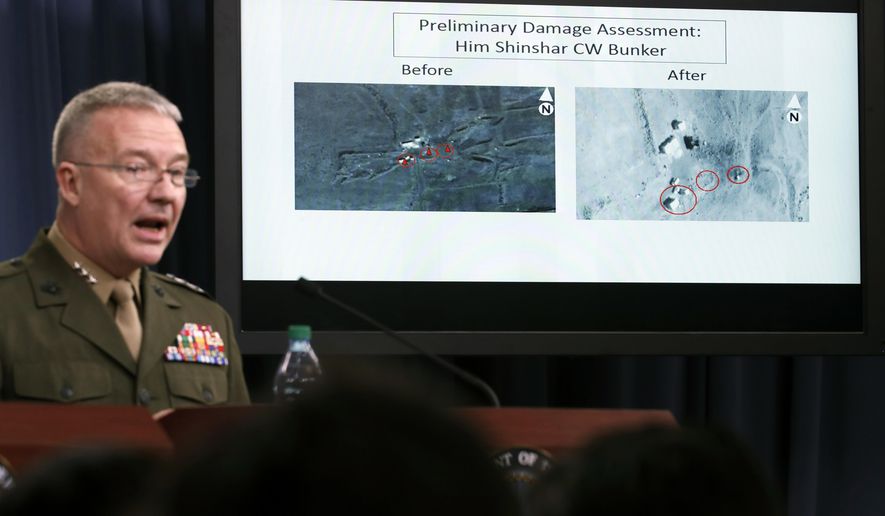 Marine Lt. Gen. Kenneth F. McKenzie Jr., director, Joint Staff, speaks as he shows photographs from before and after the U.S.-led airstrikes against Syria during a media availability at the Pentagon, Saturday, April 14, 2018, in Washington. (AP Photo/Alex Brandon)