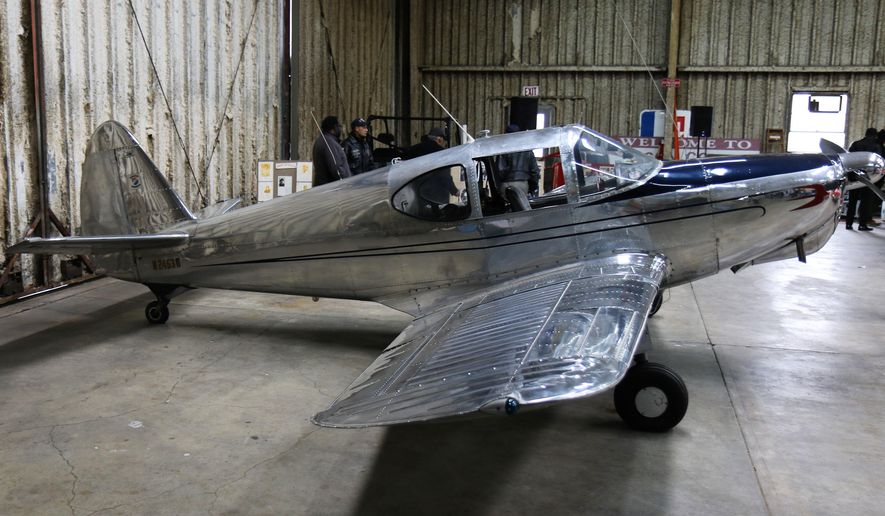 In an April 7, 2018 photo, Eugene May, of Jackson, Tennessee, earned his private pilot's license in 1948 and purchased his own 1951 Chrome Swift Global Aircraft in 1963. May was made an honorary member of the Memphis Blackhawks Aviation Association after they learned of his flying accomplishments. (Brittney Jackson/The Jackson Sun via AP)
