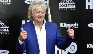 John Lodge, bassist for the Moody Blues, arrives on the red carpet before the Rock and Roll Hall of Fame Induction ceremony, Saturday, April 14, 2018, in Cleveland. (AP Photo/David Richard)
