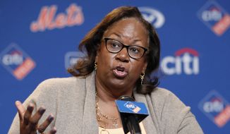 Sharon Robinson, daughter of Jackie Robinson, speaks to reporters before a baseball game between the New York Mets and the Milwaukee Brewers on Jackie Robinson Day, Sunday, April 15, 2018, in New York. (AP Photo/Kathy Willens)