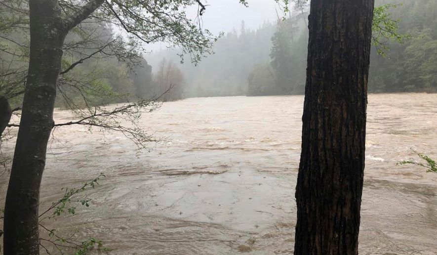 File - This photo released April 12, 2018, by The Mendocino County Sheriff's Office shows the Eel River in Northern California. Authorities searching for a family whose SUV plunged into a rain-swollen Northern California river found the vehicle and the body of a man and a girl inside it. The Mendocino County Sheriff's Office said Monday, April 16, 2018, that searchers located the car Sunday and recovered the bodies of Sandeep Thottapilly and Saachi Thottapilly. (Lt. Shannon Barney/Mendocino County Sheriff's Office via AP, File)