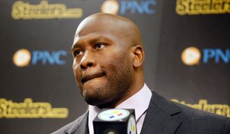 FILE - In this Sept. 5, 2014, file photo, then-former Pittsburgh Steelers linebacker James Harrison talks to reporters at a news conference about his retiring from football, in Pittsburgh. Longtime Steelers linebacker James Harrison is taking a second crack at retirement. The five-time Pro Bowler and 2008 NFL Defensive Player of the Year announced on Instagram early Monday, April 16, 2018, that he is stepping away from the game following a 15-year career. He retired briefly in September 2014 only to be lured back to the Steelers. (AP Photo/Keith Srakocic, File)