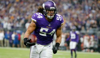 FILE - In this Dec. 17, 2017, file photo, Minnesota Vikings middle linebacker Eric Kendricks returns an interception for a touchdown during the first half of an NFL football game against the Cincinnati Bengals, Minneapolis. The Vikings have signed linebacker Eric Kendricks to a contract extension. The Vikings announced the deal Monday, April 16, 2018, the first day of offseason workouts. (AP Photo/Bruce Kluckhohn, File)