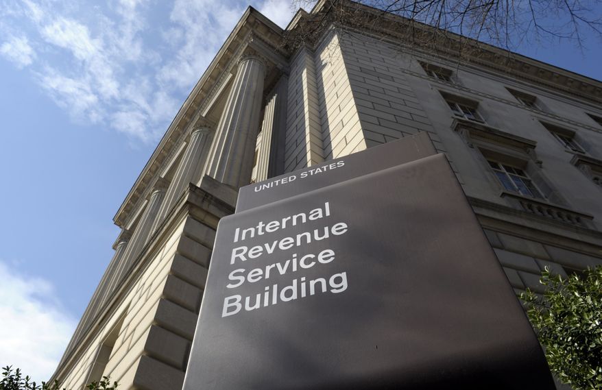 This March 22, 2013, file photo shows the exterior of the Internal Revenue Service (IRS) building in Washington. (AP Photo/Susan Walsh, File)
