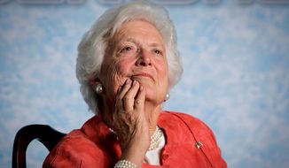 In this file photo from Friday, March 18, 2005, former first lady Barbara Bush listens to her son, President George W. Bush, as he speaks on Social Security reform in Orlando, Fla. The wife of former President George H.W. Bush is in &quot;failing health,&quot; a Bush family spokesman said Sunday, April 15, 2018, following a recent series of hospitalizations and after consulting with her family and doctors, the 92-year-old former first lady has decided not to seek additional medical treatment and will instead focus on comfort care. (AP Photo/J. Scott Applewhite, file)