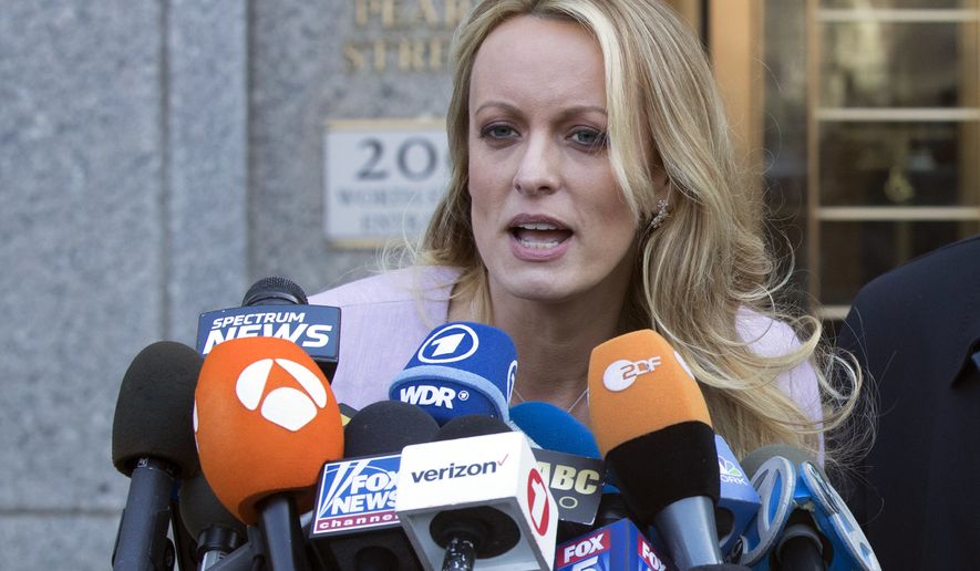 Adult film actress Stormy Daniels speaks outside federal court, Monday, April 16, 2018, in New York. (AP Photo/Mary Altaffer)