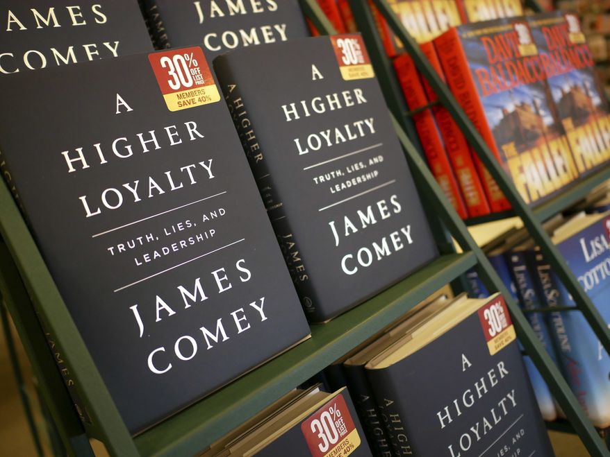 The book, &quot;A Higher Loyalty&quot; by former FBI Director James Comey is displayed at a bookstore in Hackensack, N.J., Tuesday, April 17, 2018. (AP Photo/Seth Wenig)