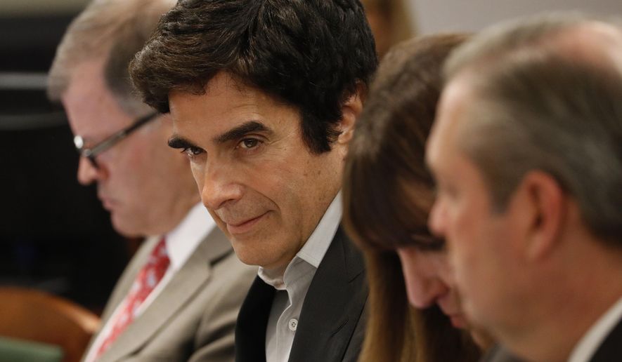 Illusionist David Copperfield appears in court, Tuesday, April 17, 2018, in Las Vegas. A Nevada jury got a rare behind-the-scenes look at a David Copperfield disappearing act after a British man claimed he was badly hurt as he participated in a 2013 show. (AP Photo/John Locher)