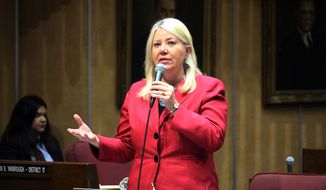In this April 6, 2017, file photo, Arizona state Sen. Debbie Lesko speaks in the Senate chambers in Phoenix. The sprawling suburbs west of Phoenix may put a brake on Democratic optimism following surprising special election wins in places like Alabama, Pennsylvania and other GOP strongholds. (AP Photo/Bob Christie, File) **FILE**