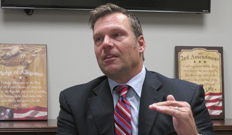 In this Monday, Oct. 16, 2017, file photo, Kansas Secretary of State Kris Kobach answers questions about his run for the Republican nomination for governor during an interview at the Johnson County Republican Party&#x27;s headquarters in Overland Park. (AP Photo/John Hanna) ** FILE **