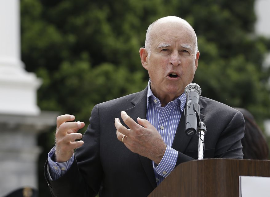 Gov. Jerry Brown addresses the crowd at a victims right rally Monday, April 9, 2018, in Sacramento, Calif. (AP Photo/Rich Pedroncelli) ** FILE **
