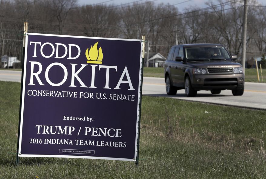 A sign promoting the campaign of GOP Senate candidate Todd Rokita is shown along a state highway in Brownsburg, Ind., Tuesday, April 17, 2018. Donald Trump&#39;s re-election campaign has issued a rebuke to Rokita, ordering the Republican to take down yard signs that could give a false impression that Rokita is endorsed by the president, two officials with direct knowledge of the matter told The Associated Press. (AP Photo/Michael Conroy)