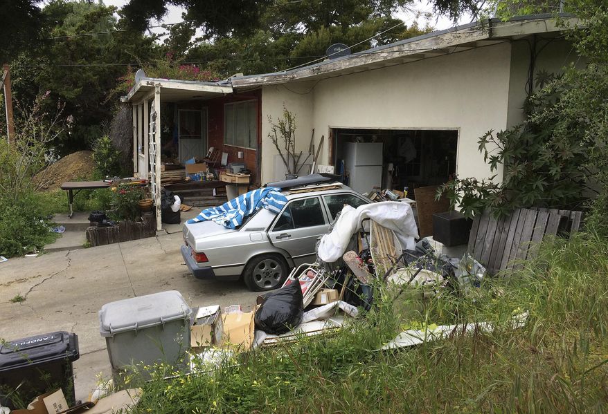 A condemned home is seen Wednesday, April 18, 2018, in Fremont, Calif. The condemned Northern California house with holes in the roof and mildew in the pipes sold last month for $1.23 million. (AP Photo/Ben Margot)
