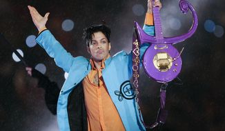 FILE - In this Feb. 4, 2007 file photo, Prince performs during halftime of the Super Bowl XLI football game in Miami. Minnesota prosecutors are planning an announcement Thursday, April 19, 2018, in their two-year investigation into Prince&#39;s death. Prince was found alone and unresponsive in an elevator at his Paisley Park estate on April 21, 2016. An autopsy found he died of an accidental overdose of fentanyl, a synthetic opioid 50 times more powerful than heroin. (AP Photo/Chris O&#39;Meara, File)