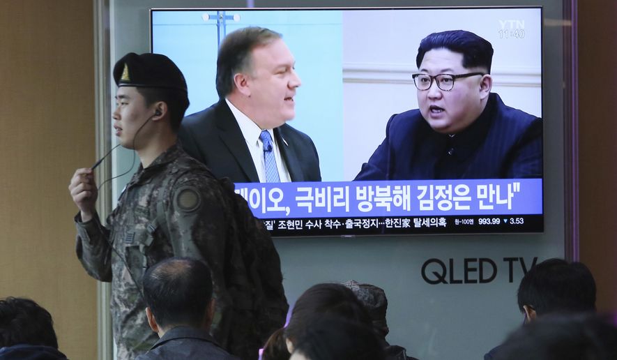 A South Korean army soldier passes by a TV screen showing file footage of CIA Director Mike Pompeo, left, and North Korean leader Kim Jong Un during a news program at the Seoul Railway Station in Seoul, South Korea, Wednesday, April 18, 2018. Pompeo recently traveled to North Korea to meet with leader Kim Jong Un, a highly unusual, secret visit undertaken as the enemy nations prepare for a meeting between President Donald Trump and North Korean leader Kim Jong Un. The signs read: &amp;quot; Mike Pompeo meets with Kim Jong Un.&amp;quot; (AP Photo/Ahn Young-joon)