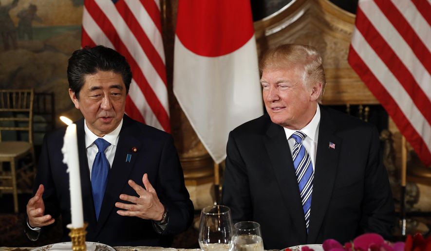 President Donald Trump talks with Japanese Prime Minister Shinzo Abe before dinner at Trump&#x27;s private Mar-a-Lago club, Wednesday, April 18, 2018, in Palm Beach, Fla. (AP Photo/Pablo Martinez Monsivais)