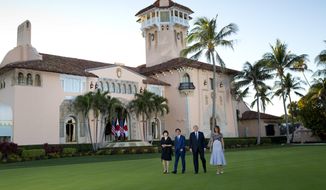 President Donald Trump, first lady Melania Trump, right, Japanese Prime Minister Shinzo Abe and his wife Akie Abe, left, walk at Trump&#39;s private Mar-a-Lago club, Tuesday, April 17, 2018, in Palm Beach, Fla. (AP Photo/Pablo Martinez Monsivais)