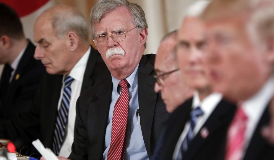 National security adviser John Bolton, second from the left, listen to President Donald Trump, far right, speak during a working lunch with Japanese Prime Minister Shinzo Abe at Trump&#x27; s private Mar-a-Lago club, Wednesday, April 18, 2018, in Palm Beach, Fla. Also at the meeting are from left, White House chief of staff John Kelly, White House chief economic adviser Larry Kudlow, and Vice President Mike Pence. (AP Photo/Pablo Martinez Monsivais)