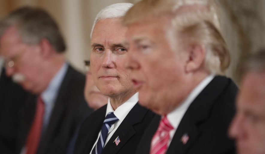 Vice President Mike Pence, left, listen to President Donald Trump, right, speak during during a working lunch with with Japanese Prime Minister Shinzo Abe, at Trump&#x27;s private Mar-a-Lago club, Wednesday, April 18, 2018, in Palm Beach, Fla. (AP Photo/Pablo Martinez Monsivais)