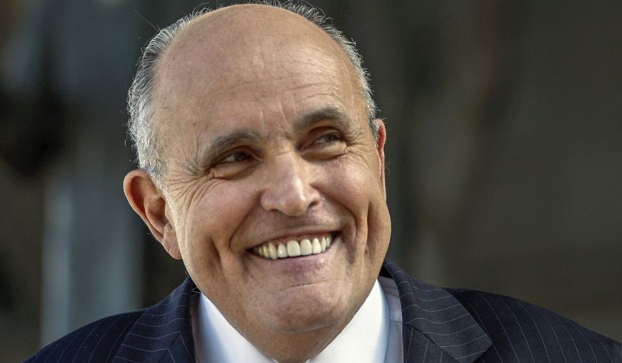 In this Thursday, Oct. 16, 2014, file photo, lawyer and former New York City Mayor Rudy Giuliani speaks at a press conference after appearing in court to call for the dismissal of a lawsuit filed against video game giant Activision by former Panamanian dictator Manuel Noriega outside Los Angeles Superior Court in Los Angeles. (AP Photo/Damian Dovarganes, File)