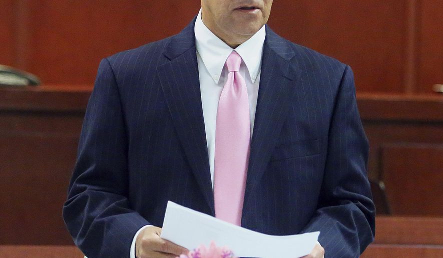 In a Wednesday, March 28, 2018 photo, County Court-at-Law Judge Rodolfo "Rudy" Gonzalez speaks during the first graduation ceremony for the county's Domestic Violence Court, at the Hidalgo County Courthouse in Edinburg, Texas. Offenders who committed a misdemeanor assault on a spouse or partner were given the opportunity to attend a year-long program and have their case dismisses upon graduation. (Joel Martinez/The Monitor via AP)