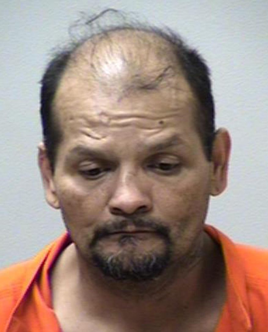 This undated photo provided by the Kalamazoo County Sheriff's Deparment shows David Teneyuqu. The Kalamazoo County Sheriff's Office said Thursday, April 19, 2018, that 48-year-old Teneyuqu died in the confrontation at the Pavilion Estates mobile home park in Pavilion Township. (Kalamazoo County Sheriff's Deparment via AP)
