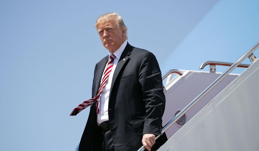 President Donald Trump walks down the stairs of Air Force One during his arrival at Palm Beach International Airport in West Palm Beach, Fla., Thursday, April 19, 2018. (AP Photo/Pablo Martinez Monsivais)