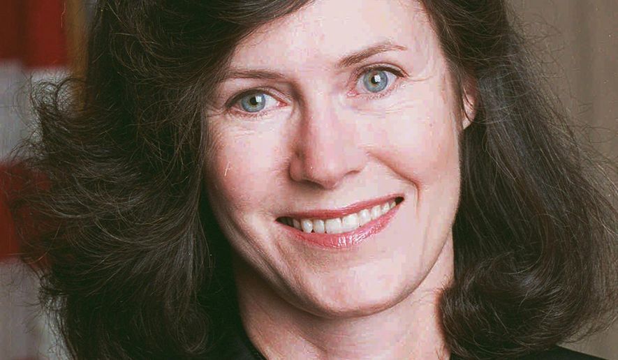 FILE - In this 1994 file photo, U.S. judge Kimba Wood poses for a portrait. Sometimes it takes a colorful judge like no other to handle a colorful case like no other. Wood, who once seemed the favorite to become the nation's first female attorney general, is refereeing a legal fight over records seized by the FBI from President Donald Trump's personal lawyer. (Bruce Gilbert/Newsday via AP)