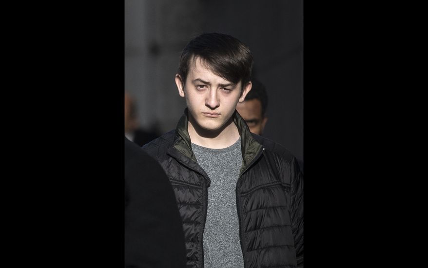 This Jan. 19, 2018, file photo shows hacker Kane Gamble in London. A British teenager has been jailed for two years for compromising the email and phone accounts of senior U.S. government officials in what a judge called acts of "cyber-terrorism." Prosecutors on Friday, April 20 said that in 2015-16, Kane Gamble, now 18, conned call centers into revealing information that got him into the accounts of then-FBI director Mark Giuliano, then-Secretary of Homeland Security Jeh Johnson and then-CIA chief John Brennan. (Victoria Jones/PA via AP)