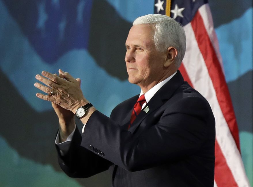 Vice President Mike Pence applauds to the crowd after speaking at an event on tax policy in Charlotte, N.C., Friday, April 20, 2018. (AP Photo/Chuck Burton) ** FILE **