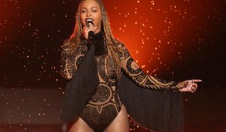 FILE - In this June 26, 2016, file photo, Beyonce performs &amp;quot;Freedom&amp;quot; at the BET Awards in Los Angeles. When Beyonce paid tribute to historically black colleges at Coachella, the singer’s grand performance reignited interest in the marching band culture creating shockwaves of excitement to students attending those schools. Many from the black community are praising Beyonce for shedding light on HBCUs. Her high-energy festival set over the weekend involved a marching band, dance troupes and step teams from black colleges along with her singing “Lift Every Voice and Sing,” known as the national black anthem. (Photo by Matt Sayles/Invision/AP, File)