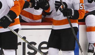 Philadelphia Flyers&#39; Valtteri Filppula (51) returns to the bench after scoring during the second period in Game 5 of an NHL first-round hockey playoff series against the Pittsburgh Penguins in Pittsburgh, Friday, April 20, 2018. (AP Photo/Gene J. Puskar)