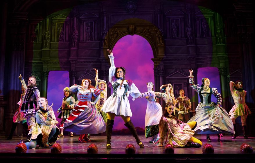 In this April 9, 2018, photo, Taylor Iman Jones as Mopsa, center, and the ensemble rehearse "Head Over Heels," a new musical, at the Curran theater in San Francisco. The Go-Go's are going to Broadway, after a brief stopover in San Francisco. "Head Over Heels," a new musical featuring songs of the Go-Go's, opened at the Curran this week for four weeks of previews before heading to Broadway's Hudson Theatre in July. The show combines the group's 1980s pop songs with an Elizabethan-era romantic comedy. Its A-list backers include Gwyneth Paltrow and Donovan Leitch as producers. (Joan Marcus/Head Over Heels via AP)