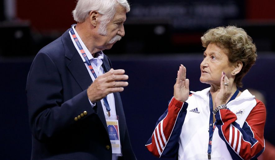 FILE - In this June 29, 2012, file photo, Bela, left, and Martha Karolyi talk on the arena floor before the start of the preliminary round of the women&#x27;s Olympic gymnastics trials in San Jose, Calif.  Former USA Gymnastics women&#x27;s national team coordinator Martha Karolyi and her husband Bela tell NBC they were unaware of the abusive behavior by a former national team doctor now serving decades in prison. Martha Karolyi led the national team for 15 years before retiring after the 2016 Rio Olympics. She tells Savannah Guthrie in &amp;quot;no way&amp;quot; did she suspect Larry Nassar was sexually abusing athletes. (AP Photo/Gregory Bull, File)