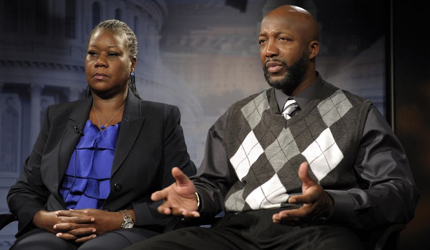 FILE - In this April 11, 2012 file photo, Sybrina Fulton, left, and Tracy Martin, parents of Trayvon Martin, appear during an interview in Washington. Six years after his death, Trayvon Martin’s name is known throughout the country as a symbol of social injustice and a rallying cry for the Black Lives Matter movement his killing helped forge. The first part of the six-part documentary series “Rest in Power: The Trayvon Martin Story,&amp;quot; will premiere Friday, April 20, 2018, at the Tribeca Film Festival. (AP Photo/Susan Walsh, File)