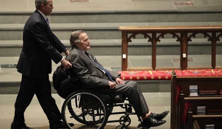 Former Presidents George W. Bush, left, and George H.W. Bush arrive at St. Martin&#x27;s Episcopal Church for a funeral service for former first lady Barbara Bush, Saturday, April 21, 2018, in Houston. (AP Photo/David J. Phillip )
