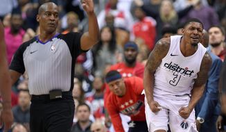 Washington Wizards guard Bradley Beal (3) reacts after he was called for his sixth foul during the second half of Game 4 of an NBA basketball first-round playoff series against the Toronto Raptors, Sunday, April 22, 2018, in Washington. (AP Photo/Nick Wass)