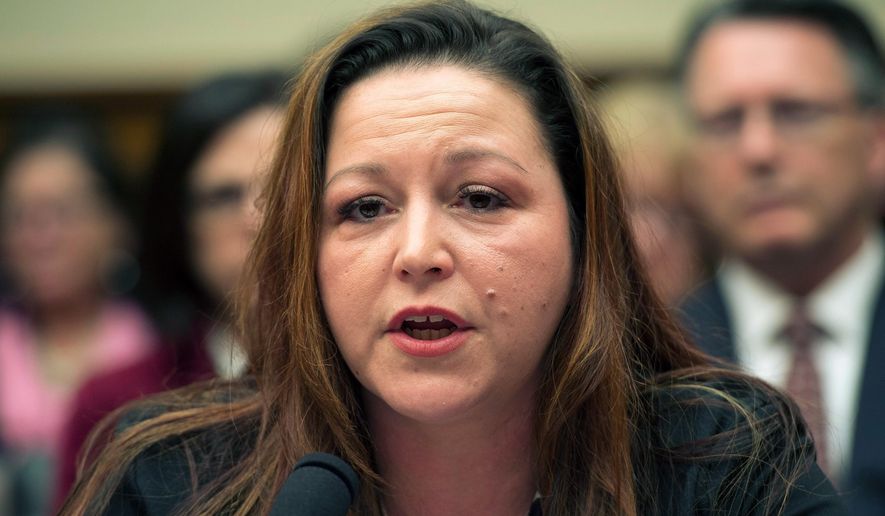 FILE - In this Feb. 3, 2016, file photo, Flint, Mich. resident LeeAnne Walters testifies on Capitol Hill in Washington. The woman who exposed the Flint, Michigan, lead disaster is among seven people around the world who are receiving the Goldman Environmental Prize, an annual award for grassroots environmental activists. Walters was repeatedly rebuffed by Gov. Rick Snyder's administration, even as she confronted state regulators with bottles of brown water flowing from her kitchen tap. (AP Photo/Molly Riley, File)