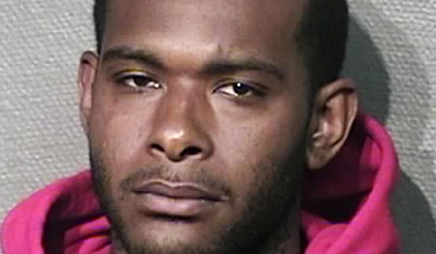 This photo provided by the Houston Police Department shows Dondrick Flagg, who has been charged with capital murder in the fatal shooting Saturday, April 21, 2018, of a woman after police say she refused to let him use her cellphone in the parking lot of her Houston apartment complex. (Houston Police Department via AP)