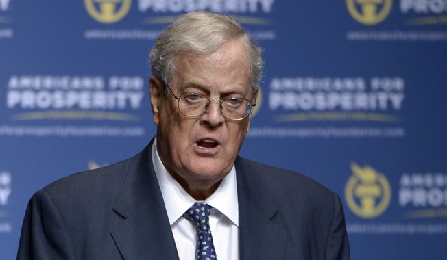 In this Aug. 30, 2013, file photo, Americans for Prosperity Foundation Chairman David Koch speaks in Orlando, Fla. A sure sign of policy success for the sprawling conservative network funded by the billionaire Koch brothers is Democratic pushback. With regulations being rolled back and huge tax cuts, Democrats question how far the Koch network&#x27;s influence extends. (AP Photo/Phelan M. Ebenhack, File)
