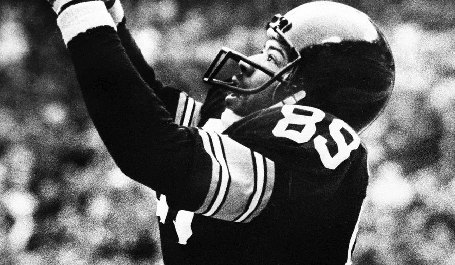 FILE - In this Jan. 6, 1980, file photo, Pittsburgh Steelers' Bennie Cunningham (89) leaps to catch a Terry Bradshaw pass in the end zone for a touchdown in the second period of the AFC championship game against the Houston Oilers, in Pittsburgh. Bennie Cunningham, a versatile tight end who starred at Clemson and won two Super Bowls with the Pittsburgh Steelers, has died. He was 63. The university says he died of cancer Monday, April 23, 2018, at the Cleveland Clinic. (The New York Times via AP, File)