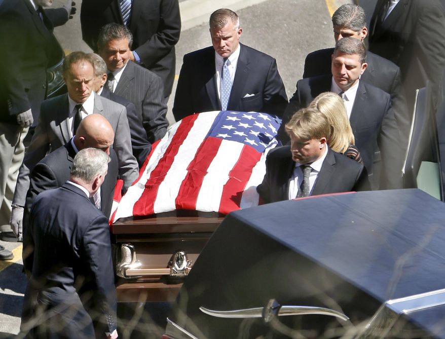 Pallbearers carry the casket of former professional wrestler Bruno Sammartino Monday, April 23, 2018, in Ross Township, Pa., a suburb just north of Pittsburgh. (AP Photo/Keith Srakocic)