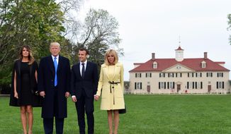 President Donald Trump, first lady Melania Trump, French President Emmanuel Macron and his wife Brigitte Macron pose for a photo in front of Mount Vernon, the home of President George Washington, in Mount Vernon, Va., Monday, April 23, 2018. (AP Photo/Susan Walsh) ** FILE **