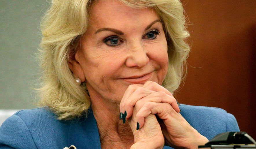 FILE - In this March 28, 2018, file photo, Elaine Wynn, ex-wife of Steve Wynn, listens during a hearing in Las Vegas. The ex-wife of Steve Wynn, who is also the biggest shareholder and co-founder of Wynn Resorts, is seeking to remove one of the company directors overseeing an internal investigation into sexual misconduct allegations against the casino magnate. Elaine Wynn said in a filing Monday, April 23, 2018, with U.S. regulators that John Hagenbuch is allied too closely with Steve Wynn. (AP Photo/John Locher, File)