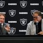 FILE - In this Jan. 8, 2018, file photo, Oakland Raiders new head coach Jon Gruden, left, answers a question next to general manager Reggie McKenzie during an NFL football news conference in Alameda, Calif. The approach McKenzie takes into the NFL draft is no different with Gruden as coach than it was in previous years with Jack Del Rio and Dennis Allen at the helm. (AP Photo/Marcio Jose Sanchez, File)
